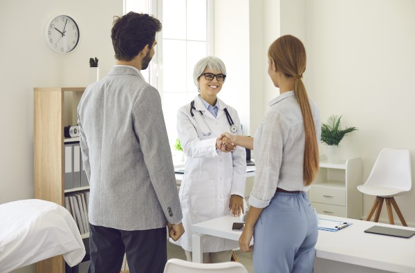 image depicting a couple getting a doctor's advice